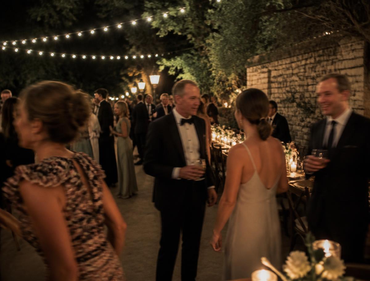 Evening event photography with warm string lighting